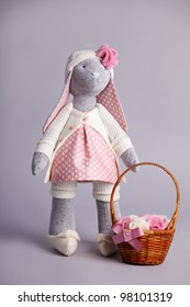 Soft Toy Rabbit On Gray Background. Handmade