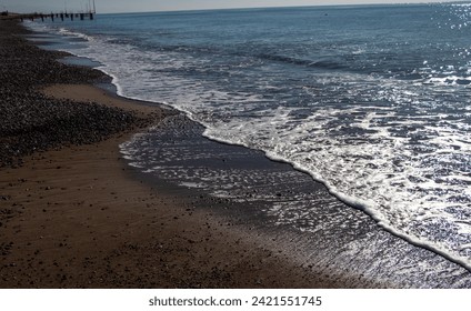 Soft wave lapped on empty sandy beach, Summer Background. copy space
