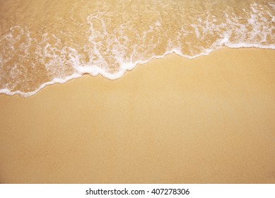 Soft wave of the sea on the sandy beach - Powered by Shutterstock