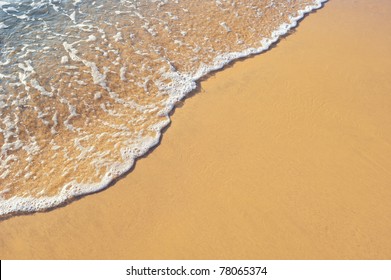 Soft wave of the sea on the sandy beach - Powered by Shutterstock