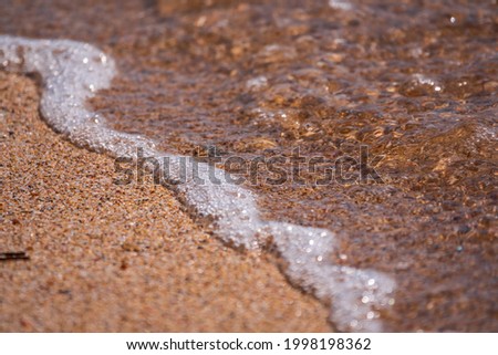 Similar – Lots of colorful stones on the beach