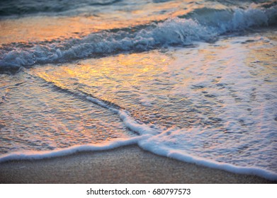 Soft wave of sea at sunset