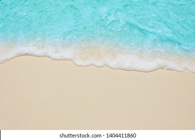 Soft waves of blue sea on the Maldives beach for the background. - Powered by Shutterstock