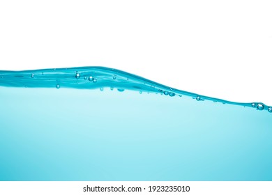 Soft waves create blurry bubbles floating beneath clean blue liquid, clear water.