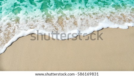 Soft waves on the sand beach 