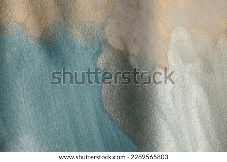 Soft wet watercolor paper texture blot painting wall. Abstract nacre silver, gold, beige marble copy space background.