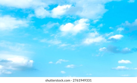Soft white clouds drift across a bright blue sky