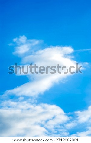 Soft White Heart-Shaped Cloud in Clear Blue Sky