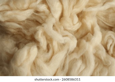Soft white wool texture as background, closeup