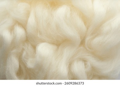 Soft white wool texture as background, closeup