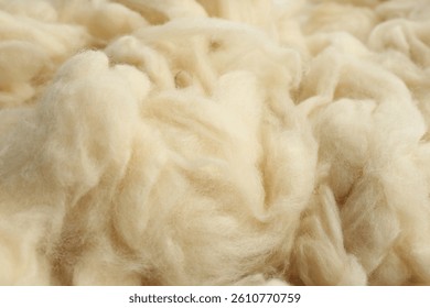 Soft white wool texture as background, closeup