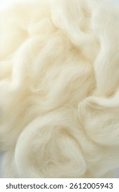 Soft white wool texture as background, closeup