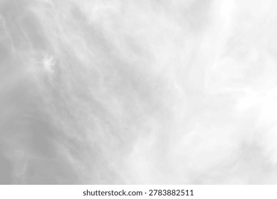 Soft, wispy clouds create a serene texture in the sky, offering a tranquil and dreamy background. perfect for design projects, this image evokes calmness and natural beauty with its gentle, ethereal ambiance.