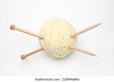 Soft Yarn With Knitting Needles On White Background