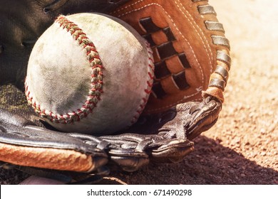 Softball And Glove.