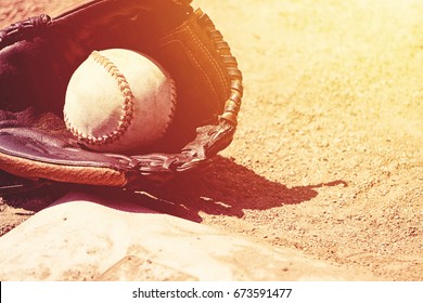 Softball And Glove.
