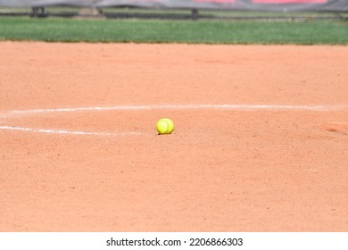 Softball On The Infield Of A Softball Field