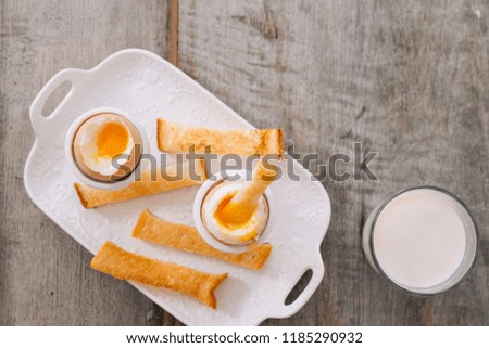 soft-boiled egg on a brown table