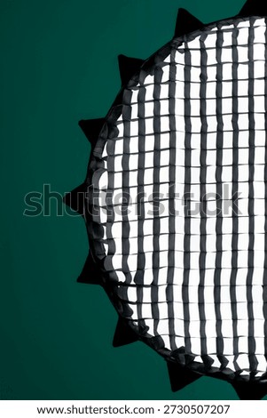 softbox with grids on an emerald background