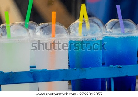 A softdrink in the plastic cup