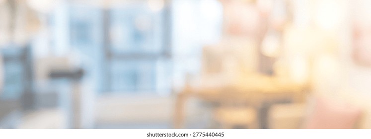 A softly blurred interior space featuring warm lighting and a cozy atmosphere, suggesting a modern living or workspace.