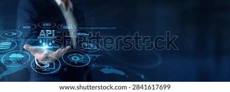 Software developer analyzing integrations, holding handheld devices for API connections in the Global network space. Building digital bridges efficiently. Ensuring seamless data flows now.
