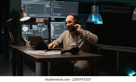 Software developer attending online videocall conference on laptop, programming html script and talking on remote teleconference. Using videoconference meeting to chat on webcam. Handheld shot. - Powered by Shutterstock - Get 15% off with code: PIKWIZARD15