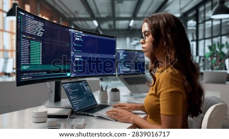 Software Developer Codes Remotely Using Cloud-based IDE On Her Secure Desktop.