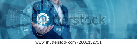 Software developer coding interfaces holding a hand scanner. API continuous data flow on global network glowing connection interfaces. Advanced digital systems linking remote software nodes.