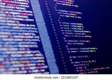 The software developer is doing php coding. Abstract code background. Selective focus code on computer screen