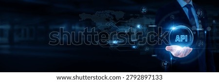 Software developer hand holding with worldwide network connection, system integration, cloud computing, web services, API development concept.