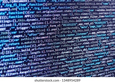 Software developer programming code on computer monitor. Internet app development and design. Program code and visual UI/UX. Programmer working on his laptop computer concept. 