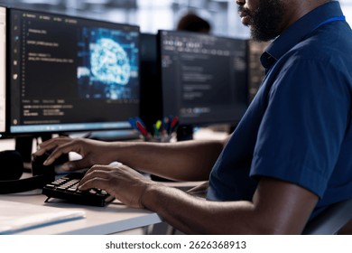 Software developer reconfiguring neural networks server farm to optimize it for data processing requirements. Machine learning specialist ensuring data center operates efficiently