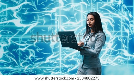 Software developer solving tasks on laptop, running artificial intelligence programming scripts. Woman using notebook to write lines of code for AI applications development, camera A
