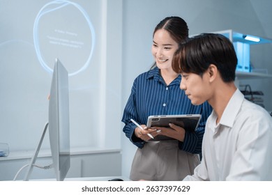 software developer talk strategy plan to executive write prompt AI bot IT app program data analytics in tech startup office.Projected visuals and glowing code on screen.AI chatbot technology concept