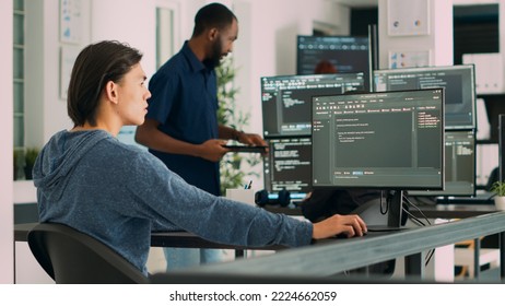 Software Developer Typing Learning App Code On Computer, Sitting At Desk In Big Data Office. Cloud Programer Working With Html Database Script In Cyber Security Agency. Handheld Shot.