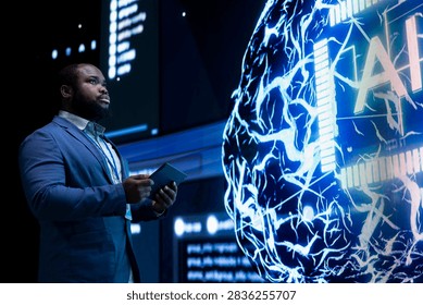 Software developer uses advanced neural network technology and AI for decision making while offloading programming tasks to an agentic artificial intelligence assistant