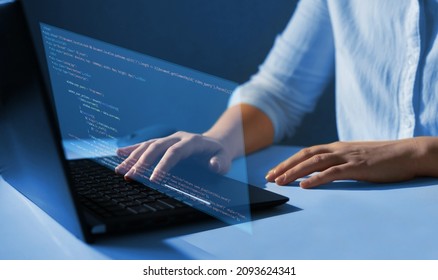Software developer working at programming code script on virtual digital  screen.Development and coding technology concept. IT coding and new technology revolution. 
