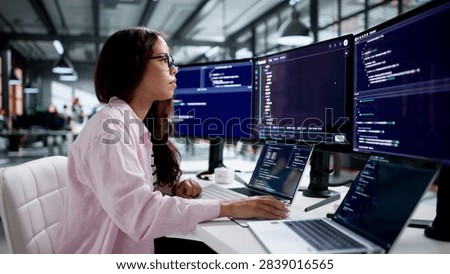 Software Developer Writes Secure Code Using Cloud-based IDE On Laptop Remotely.