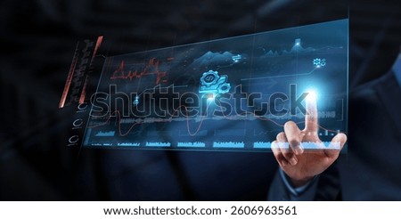 Software Development: Businessman analyzing data strategy with graph on digital screen. Code optimization, project management, bug tracking, feature deployment, collaboration, user experience.