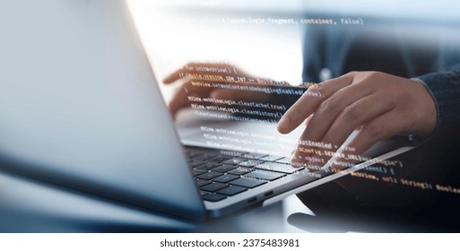 Software development concept. Coding programmer, software engineer working on laptop with javascript computer code on virtual screen, internet of things IoT, digital technology - Powered by Shutterstock