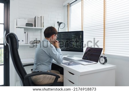 Software development concept, Male programmer read data code to thoughtful about developing website.