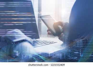 Software development, digital technology, big data, IoT Internet of Things concept. Coding software developer working on laptop computer and smartphone, computer code and big data VR screen