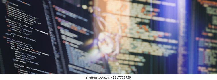 Software development panoramic background. Complex programming script on dark monitors with colorful syntax and bokeh effect.