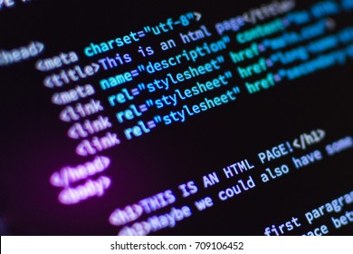 Software development. Software source code. Programming code. Writing programming code on laptop.