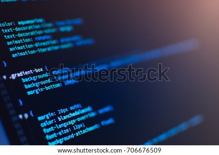 Software development. Software source code. Programming code. Writing programming code on laptop.