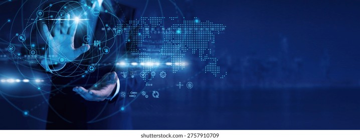 Software engineer analyzing API integrations, data exchange flows and system connectivity on virtual screen. API technology enabling global networking, communication and scalable digital platforms.
