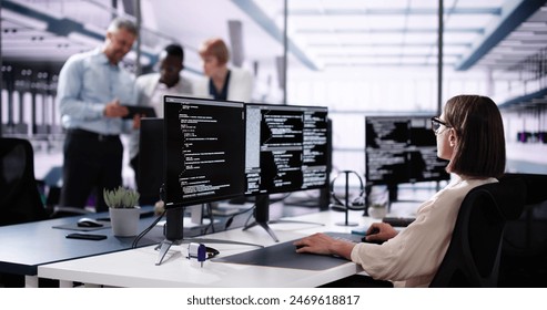 Software Engineer Developer Using Desktop Computer. Coding On PC - Powered by Shutterstock