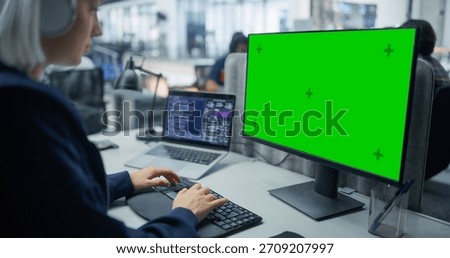 Software Engineer Enhances Ai Systems on Dual Monitors in a Modern Office, Focusing on Algorithm Refinement, Data Integration, Collaborative Programming in Innovative Artificial Intelligence Projects.