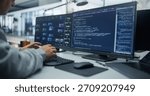 Software Engineer Optimizes Ai Code on Dual Monitors in a Sleek Office. Focus on Data Analysis, Code Efficiency, and Collaborative Ai Development for Innovative Software Solutions.